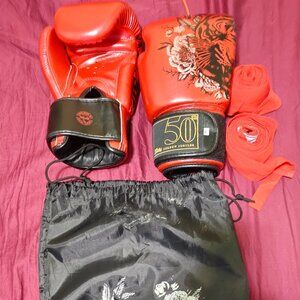 Fairtex golden jubilee 16 ounce boxing gloves and wraps